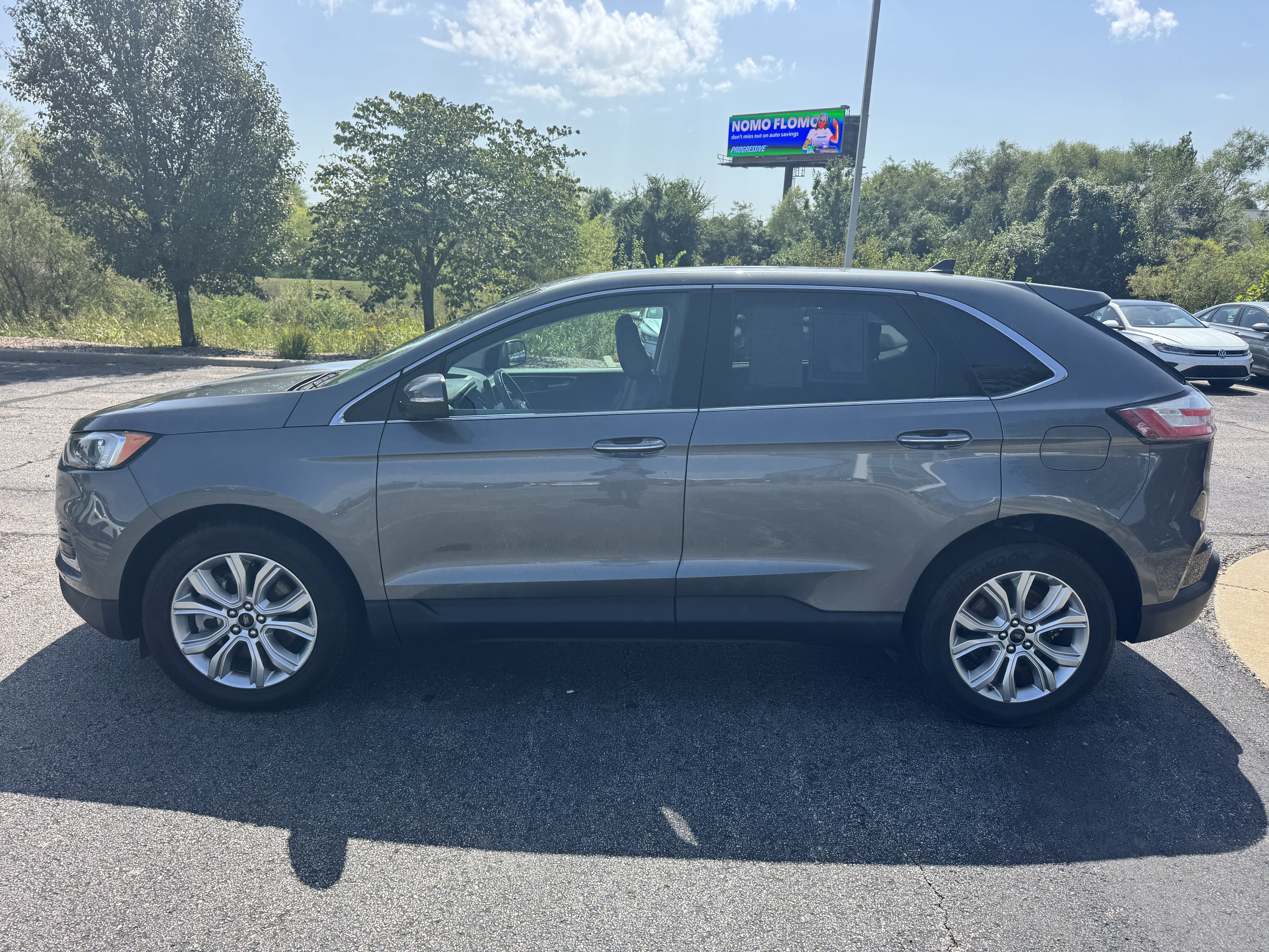 Used 2023 Ford Edge Titanium with VIN 2FMPK4K95PBA32619 for sale in Kansas City